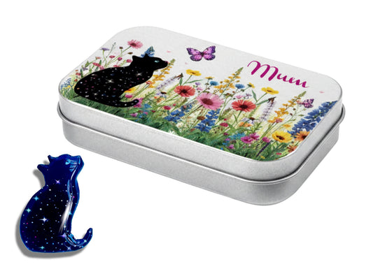 Metallic tin with floral design and 'Mum' text, featuring a blue cat figurine.