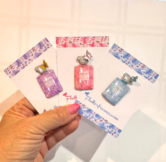 Three small perfume bottles decorative wall decor