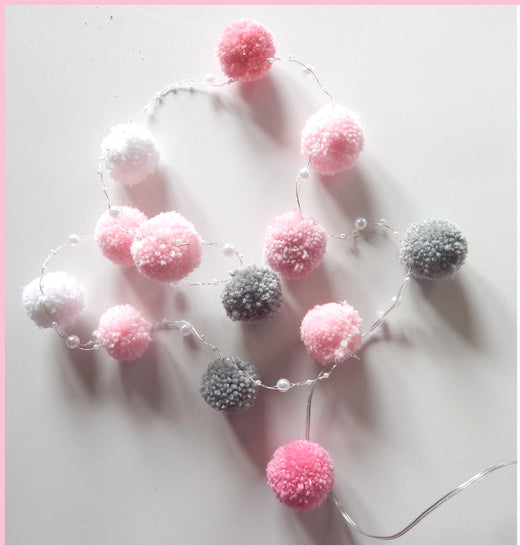 pink pom pom fairy lights nursery decor