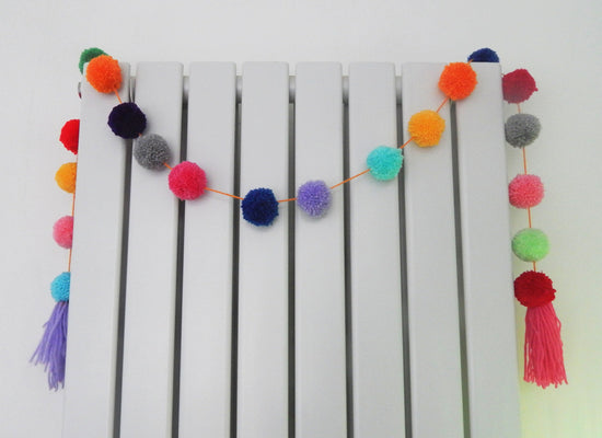 handmade pom pom garland. super colorful