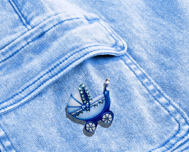 blue baby carriage handmade with diamantes brooch . Baby Shower