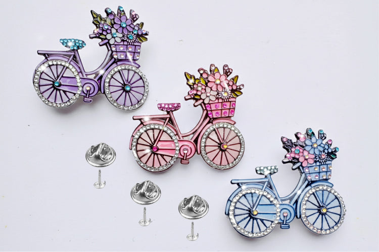  bicycle brooches with floral baskets 