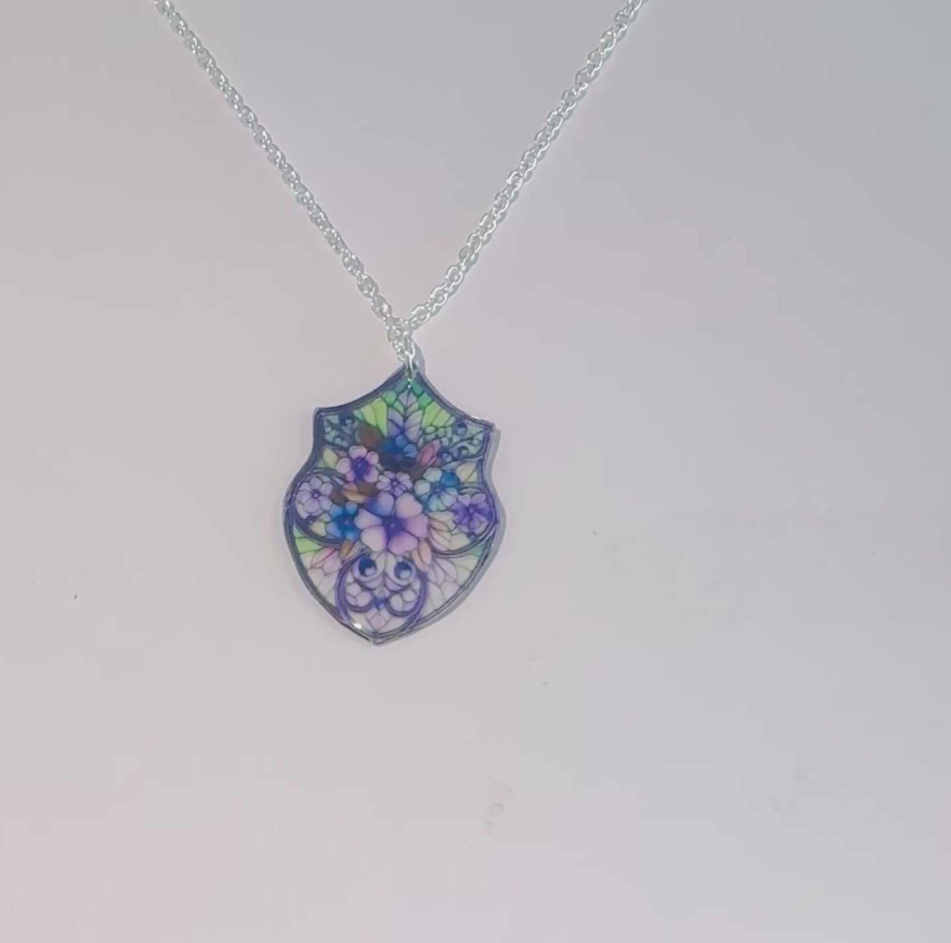 Stained glass style Church window pendant. Totally unique to Flutterframes