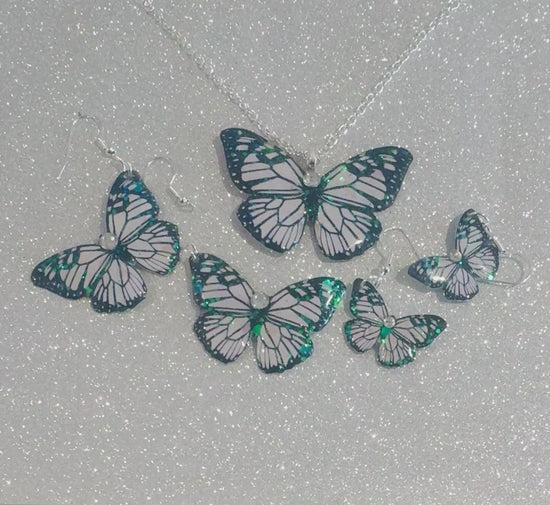handmade Black  and white  butterfly jewelry made from soda cans recycled clever
