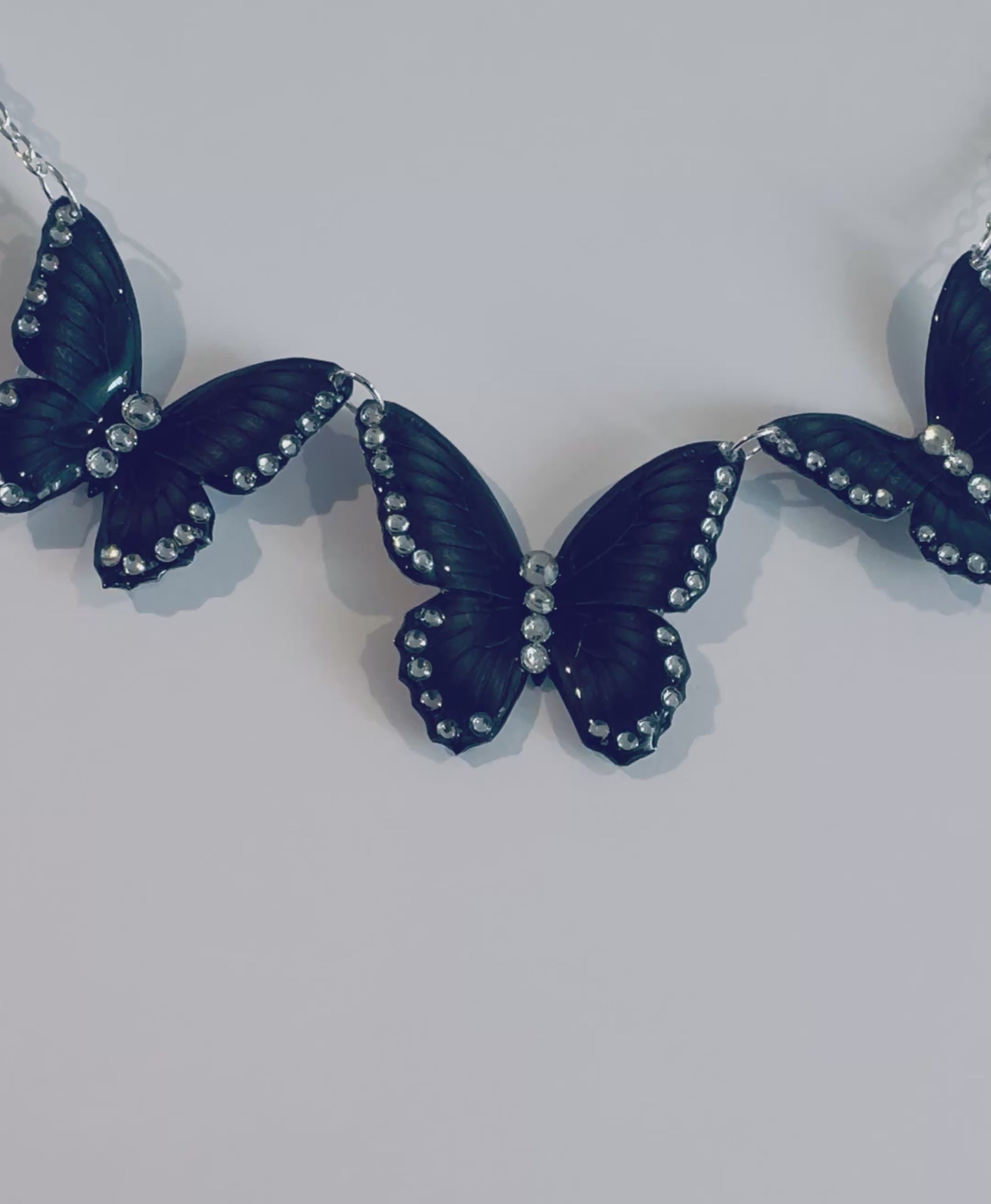 black diamante butterfly necklace and earrings