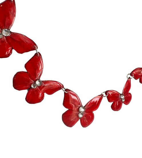 red butterfly-themed statement necklace
