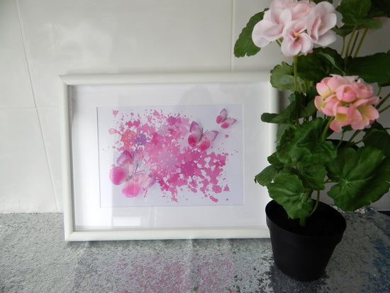 Pink butterfly framed picture